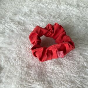 Lululemon Athletica dark orange hair scrunchie